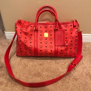 red mcm duffle bag